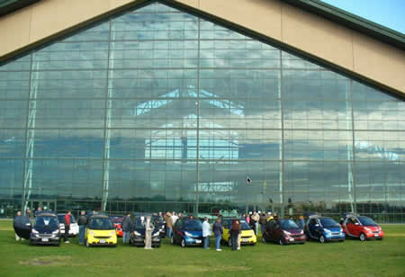 smart cars in front of the Spruce Goose